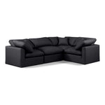 Indulge 105" Vegan Leather Upholstered 4pc. Modular Sectional in Black