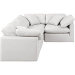 Indulge 105" Vegan Leather Upholstered 4pc. Modular Sectional in Cream