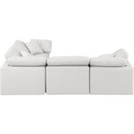Indulge 105" Vegan Leather Upholstered 4pc. Modular Sectional in Cream